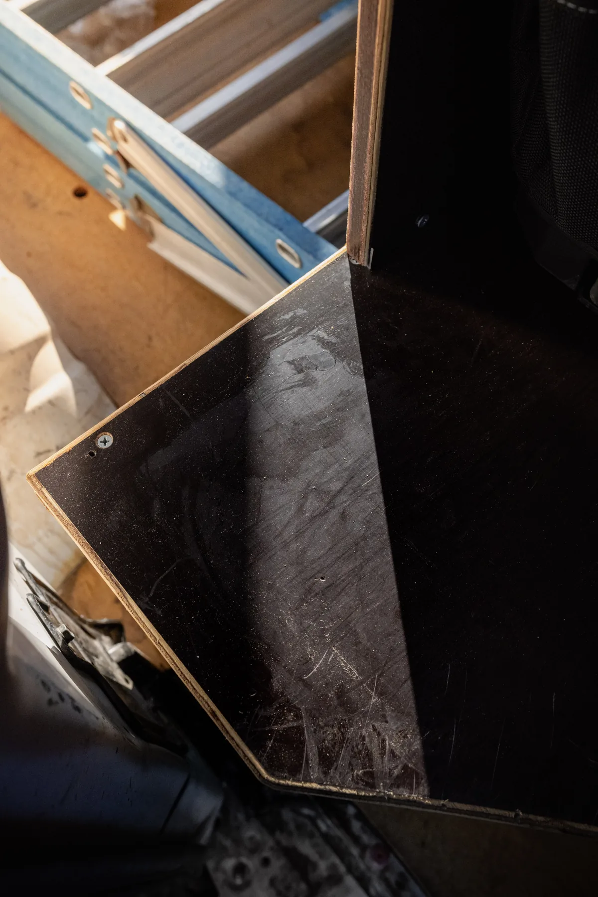 Plywood panel detail from a custom trade vehicle fitout