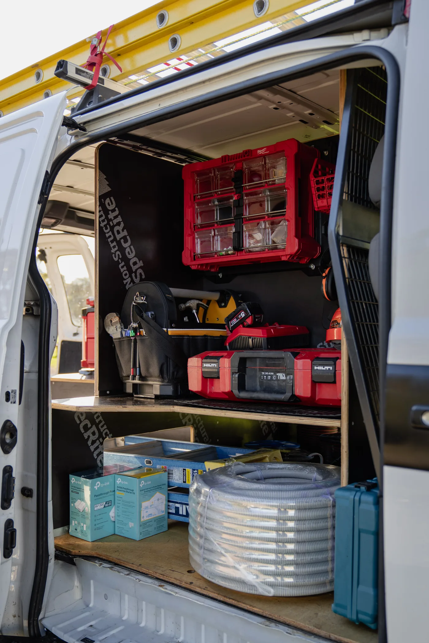 Side loading door of a van showing a mounted tool wall
